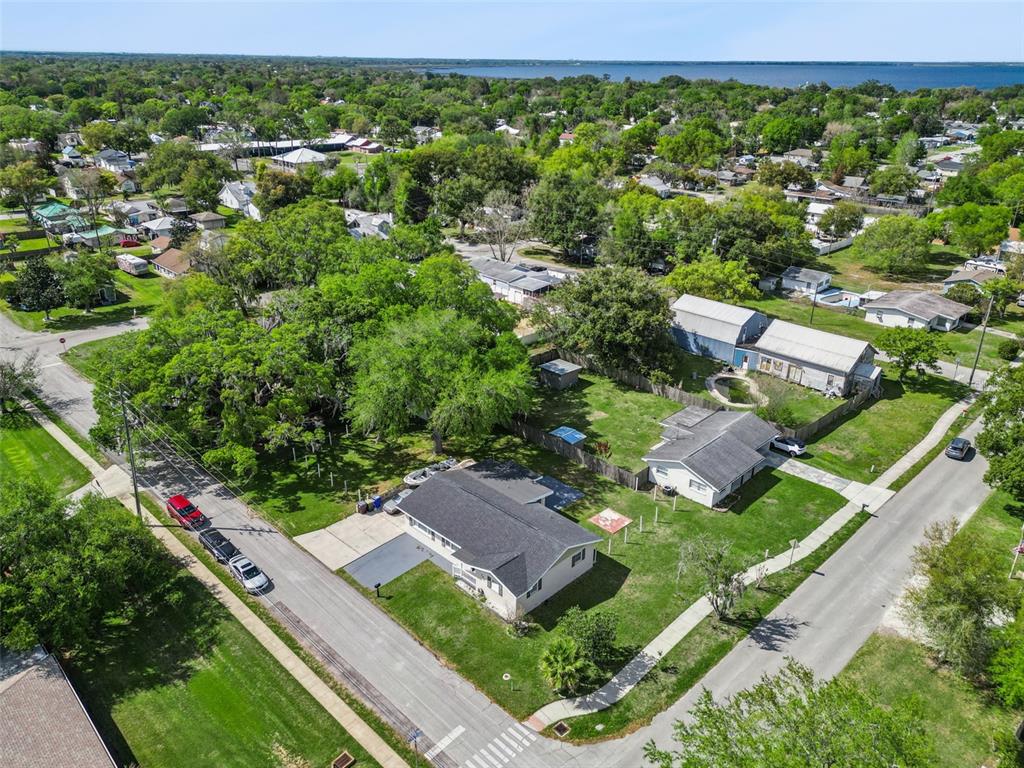 700 9th Street St. Cloud, FL 34769 - Photo 61 of 78 an aerial view of residential houses with outdoor space