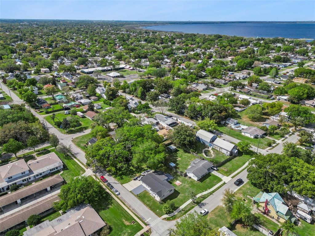 700 9th Street St. Cloud, FL 34769 - Photo 62 of 78 an aerial view of a residential houses with city view
