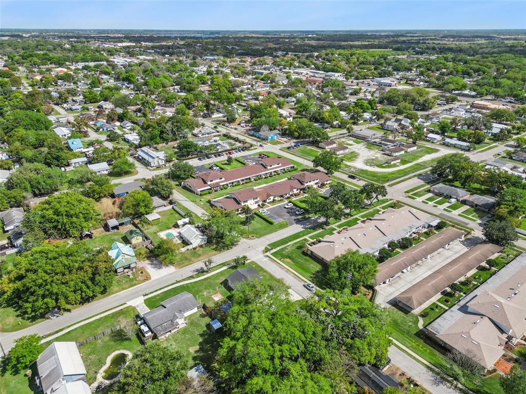 700 9th Street St. Cloud, FL 34769 - Photo 66 of 78 an aerial view of residential houses with outdoor space