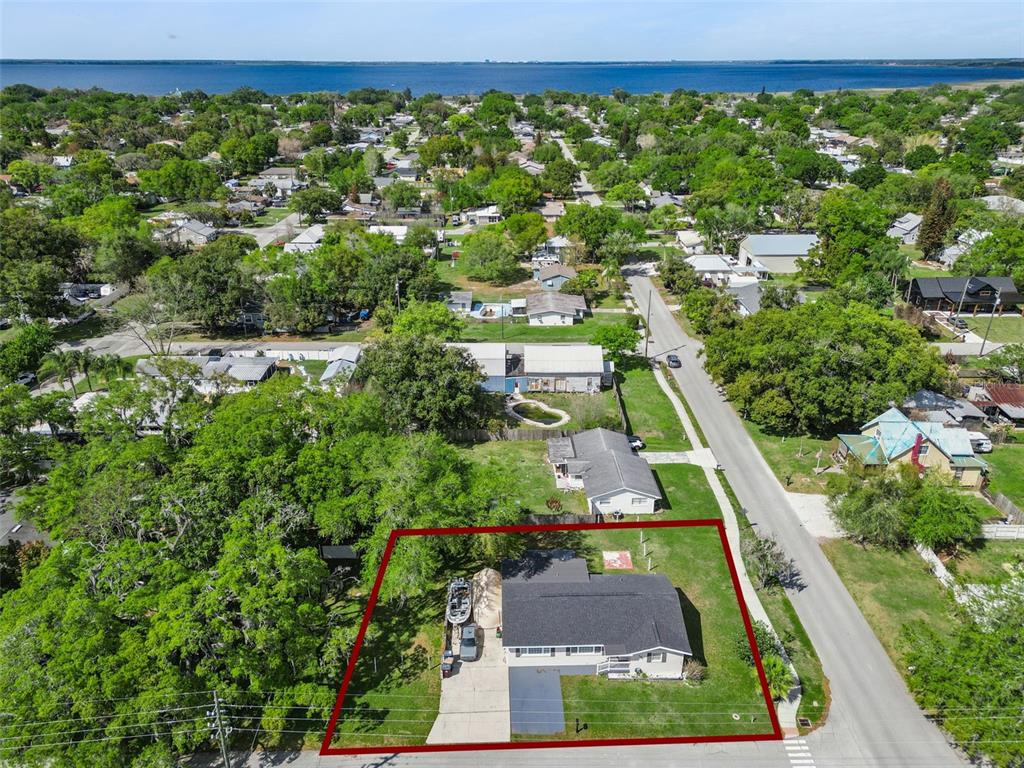 700 9th Street St. Cloud, FL 34769 - Photo 69 of 78 an aerial view of residential houses with outdoor space and street view