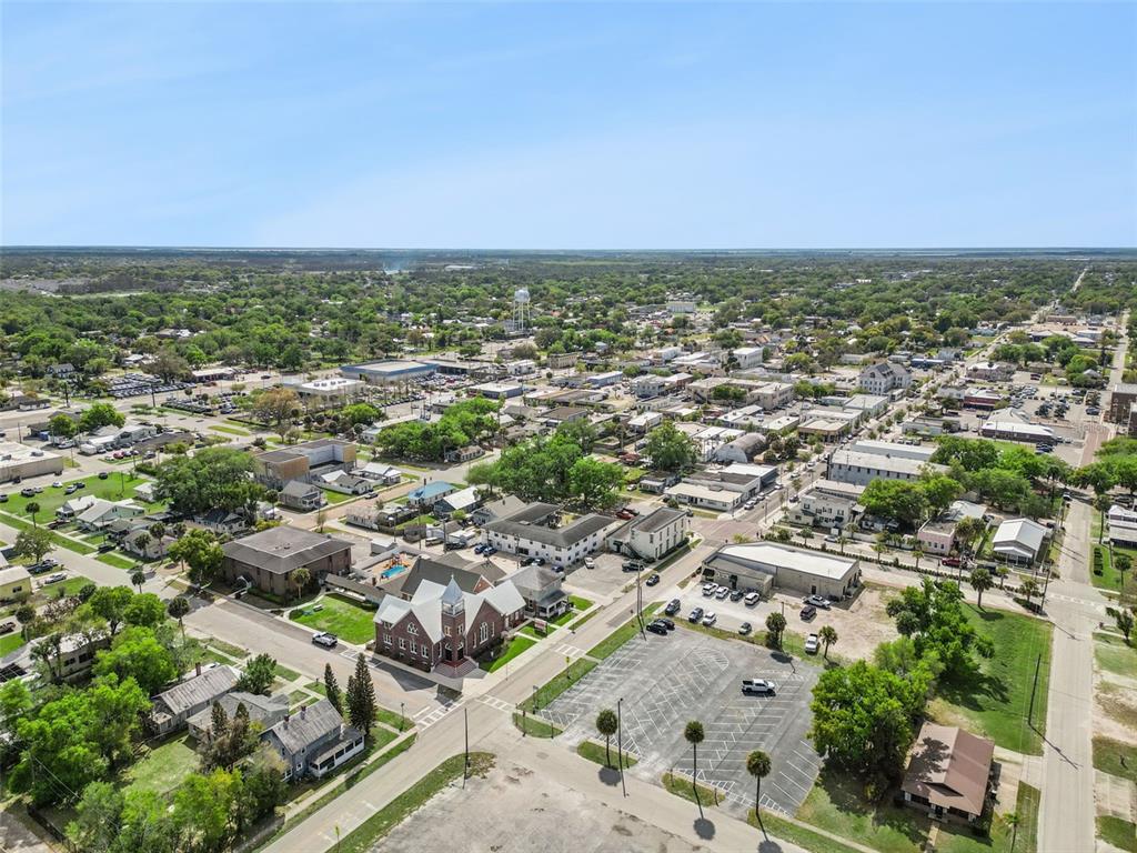 700 9th Street St. Cloud, FL 34769 - Photo 74 of 78 an aerial view of a city with houses