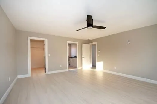 a view of an empty room and window