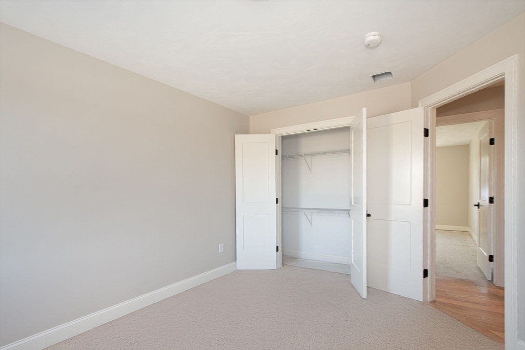 548 Harvard Street Whitman, MA 02382 - Photo 22 of 37 a view of an empty room