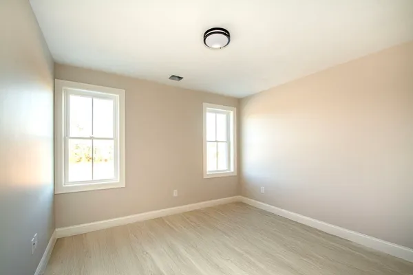 an empty room with windows