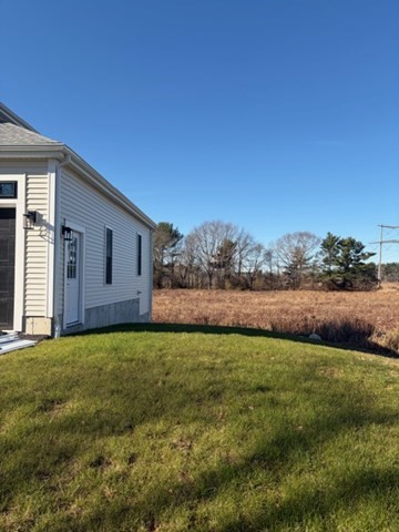 548 Harvard Street Whitman, MA 02382 - Photo 36 of 37 a view of a patio with a big yard