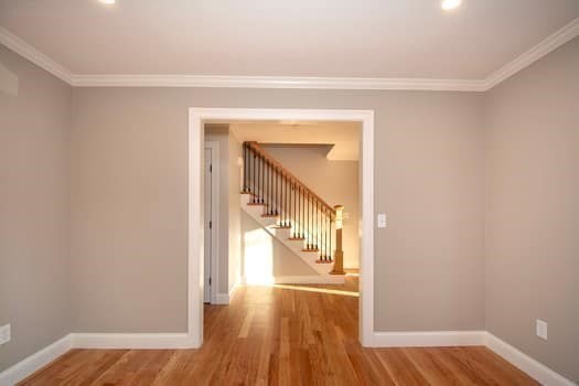 548 Harvard Street Whitman, MA 02382 - Photo 7 of 37 a view of a hallway view with wooden floor and staircase