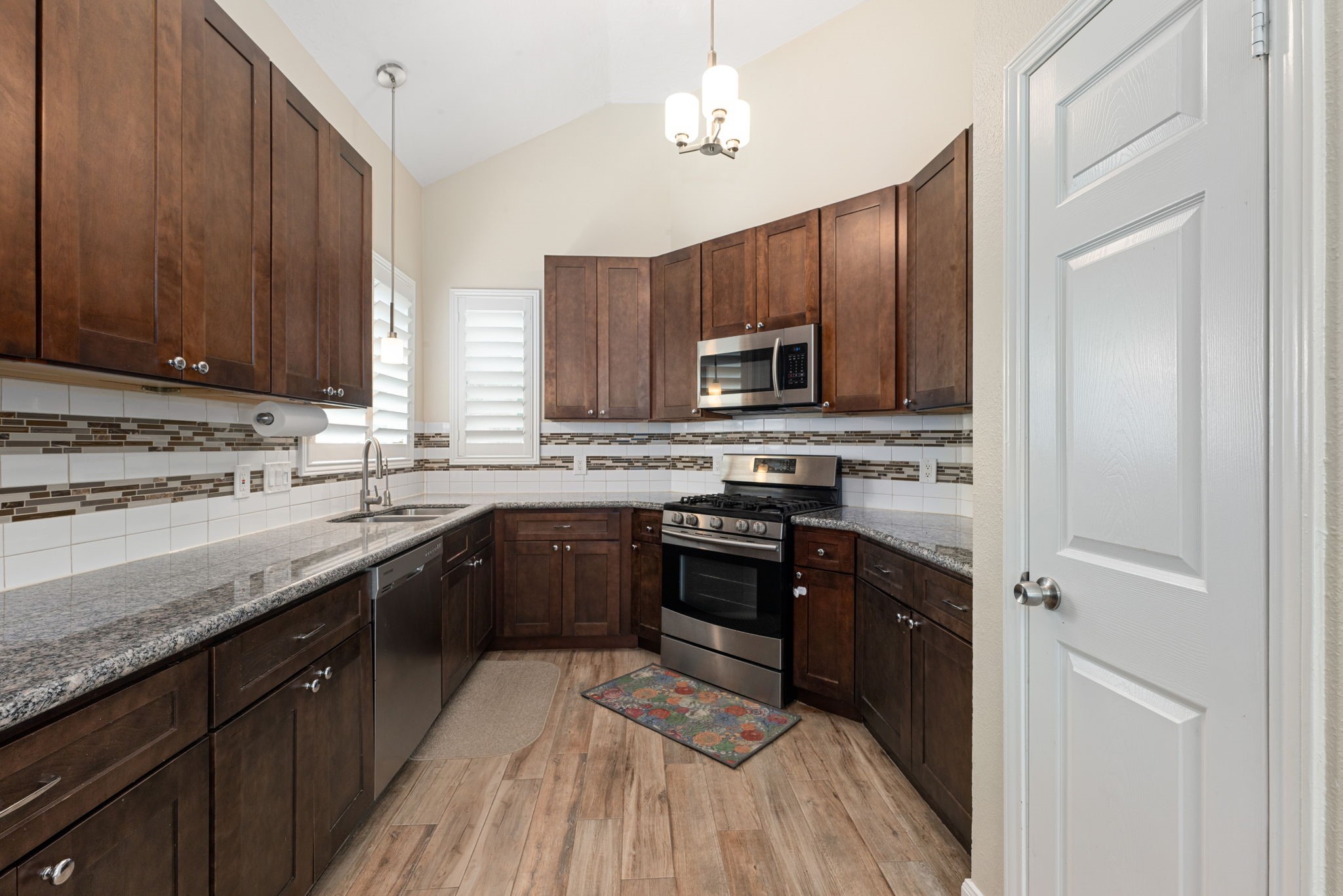 1915 Mercoal Drive Spring, TX 77386 - Photo 13 of 50 Well-appointed kitchen featuring abundant cabinetry, generous counter space, and modern appliances.