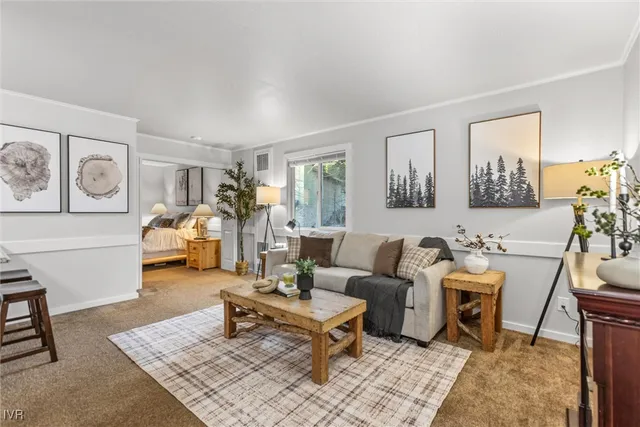 a living room with furniture and a table