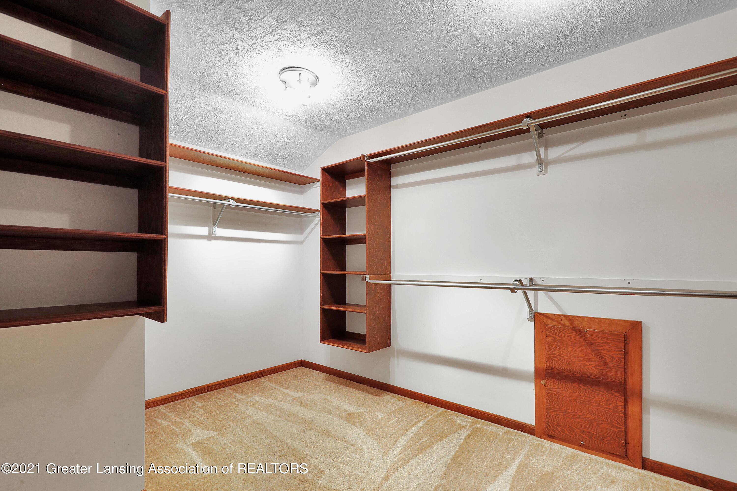 1494 Dennison Road East Lansing, MI 48823 - Photo 25 of 40 Primary BR Walk-in Closet