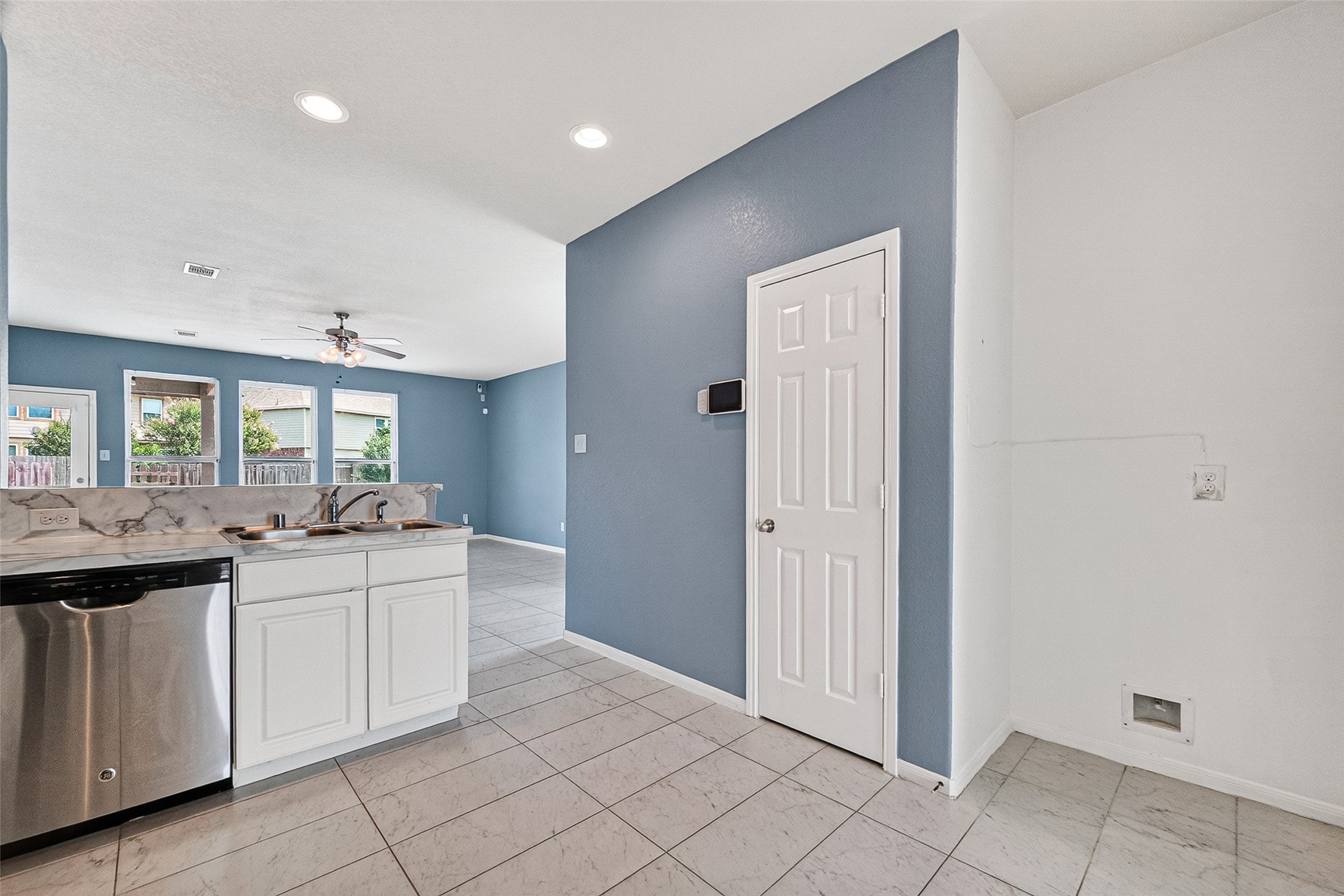 2702 Modano Court Fresno, TX 77545 - Photo 10 of 46 a kitchen with a sink and cabinets