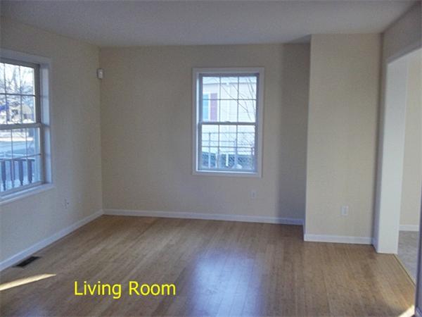 193 Pendleton Avenue Springfield, MA 01109 - Photo 3 of 22 an view of an empty room with a window