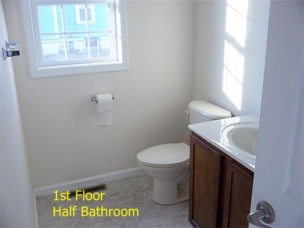 193 Pendleton Avenue Springfield, MA 01109 - Photo 7 of 22 a bathroom with a granite countertop toilet and a sink