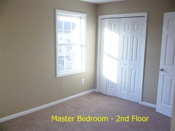 193 Pendleton Avenue Springfield, MA 01109 - Photo 9 of 22 a view of an empty room with a window