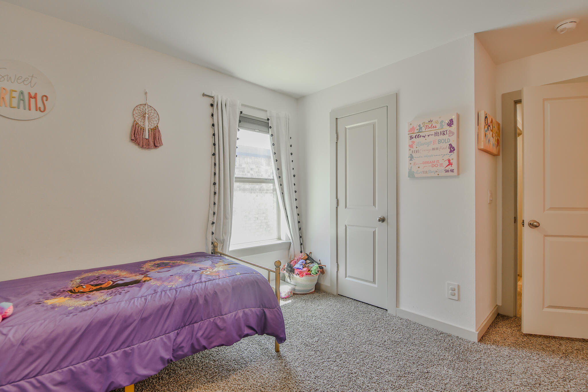 7406 9th Street Lubbock, TX 79416 - Photo 12 of 54 a bedroom with a bed and a window