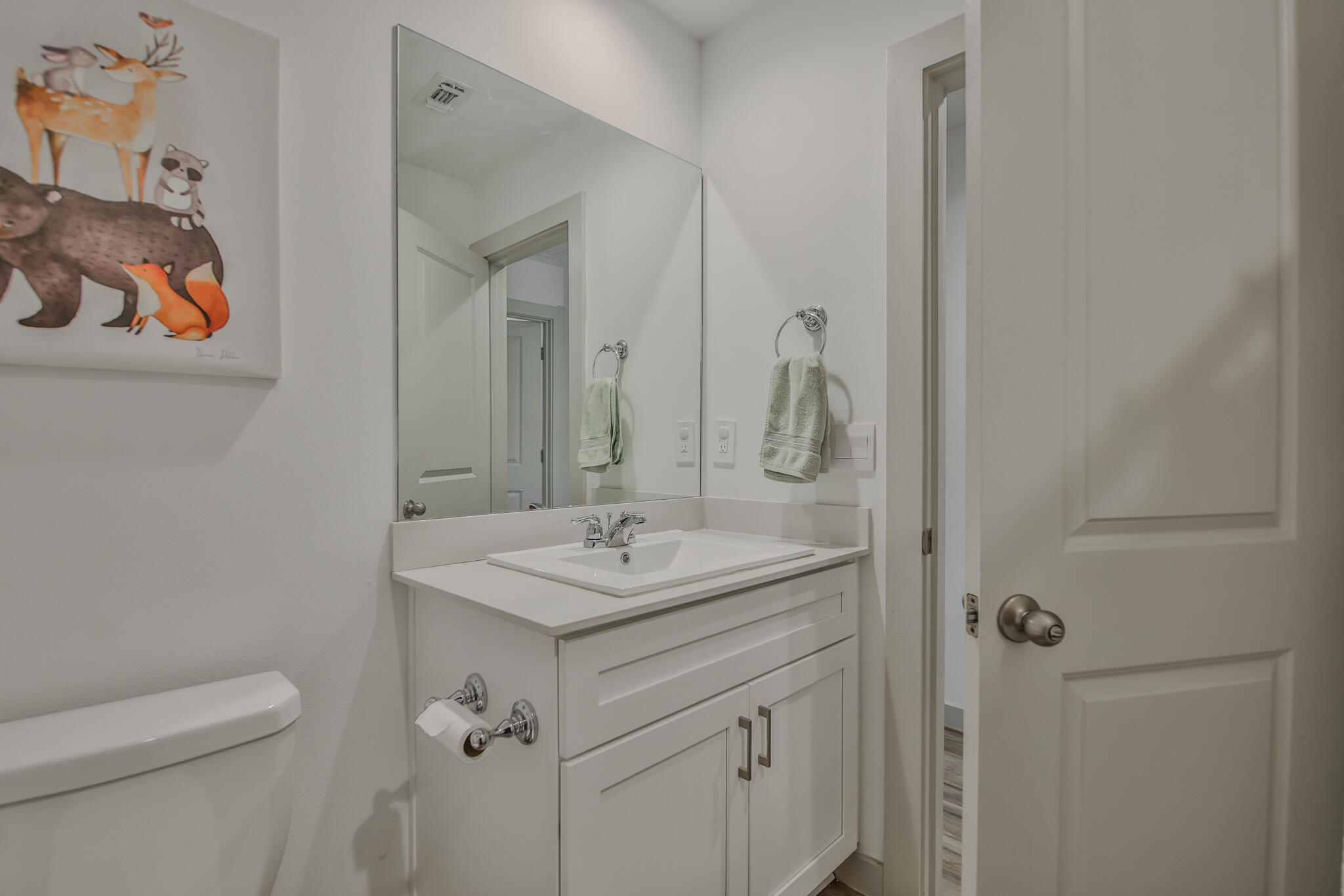 7406 9th Street Lubbock, TX 79416 - Photo 20 of 54 a bathroom with a sink a toilet and shower