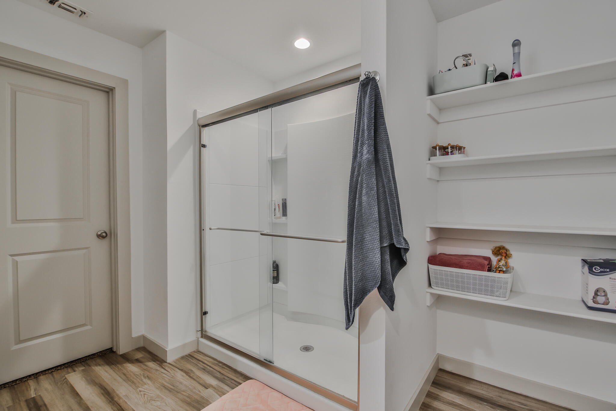 7406 9th Street Lubbock, TX 79416 - Photo 50 of 54 a bathroom with a bathtub and a shower