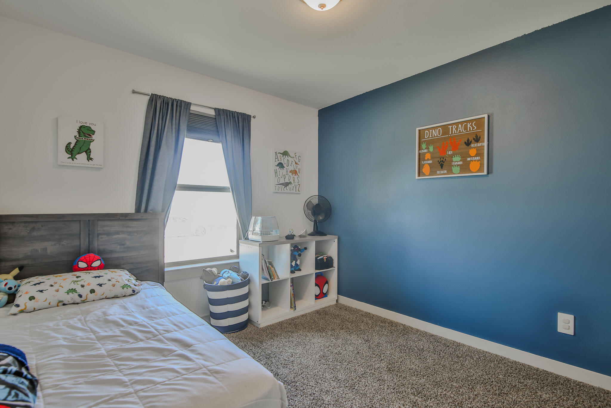 7406 9th Street Lubbock, TX 79416 - Photo 8 of 54 a room with a bed and a window