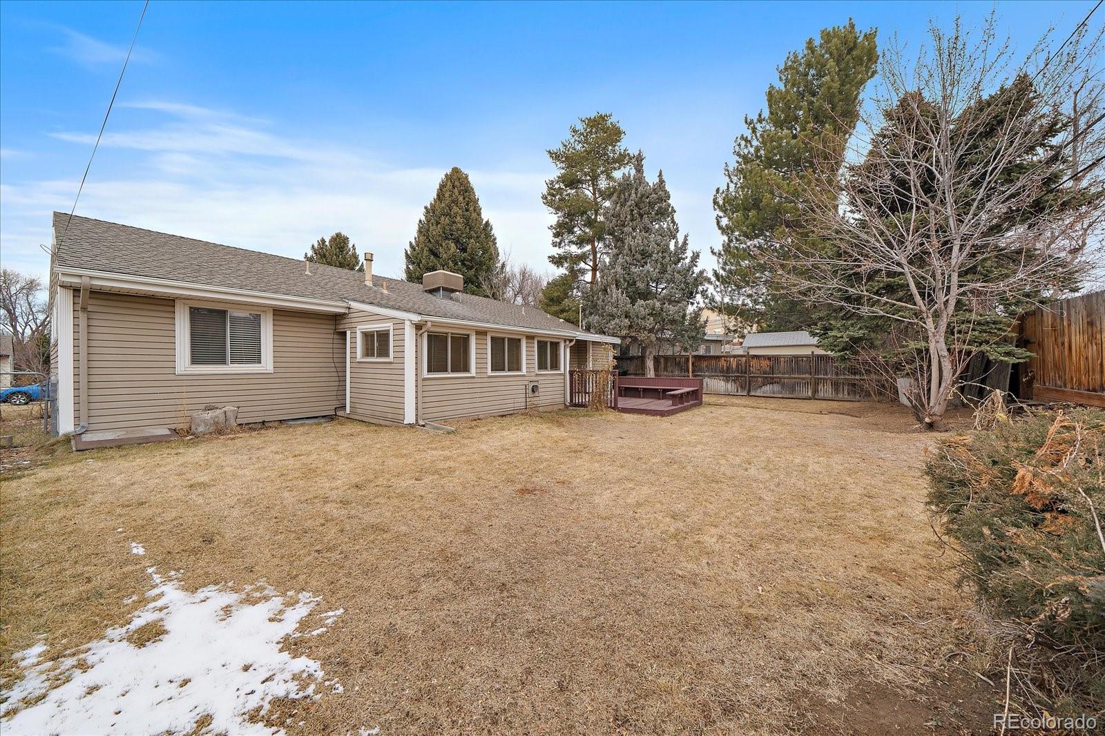 2510 South Cherry Street Denver, CO 80222 - Photo 30 of 37 a view of a house with a backyard