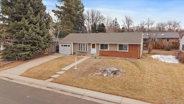 front view of house with a yard