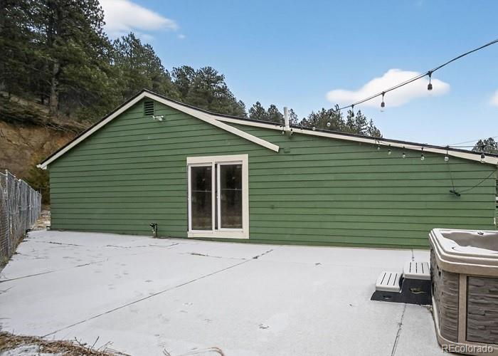 6498 South Turkey Creek Road Morrison, CO 80465 - Photo 4 of 19 a front view of a house with plants