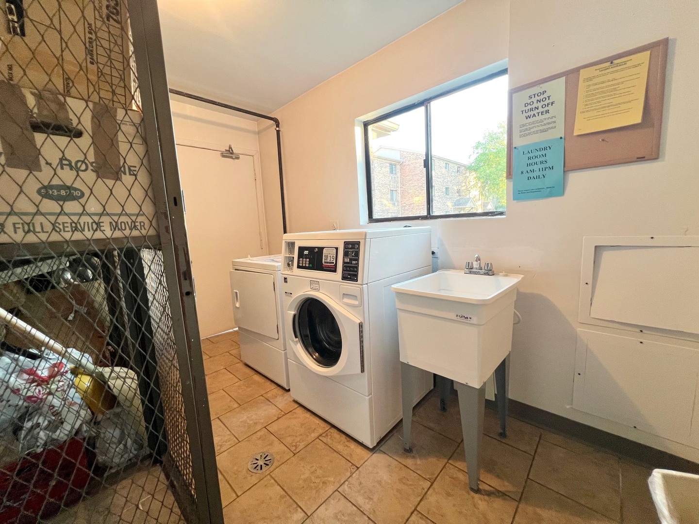 2219 Nichols Road, Unit 17A Arlington Heights, IL 60004 - Photo 17 of 19 a utility room with dryer and washer