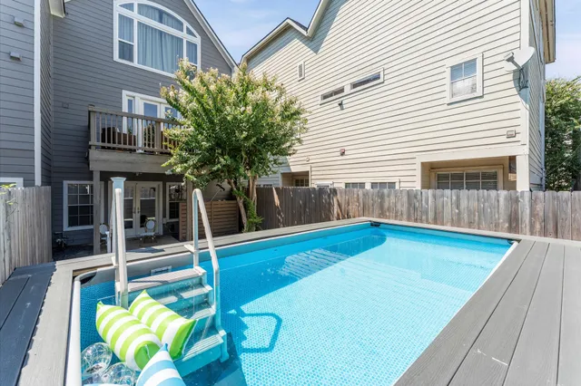 a picture of a bathroom with a shower