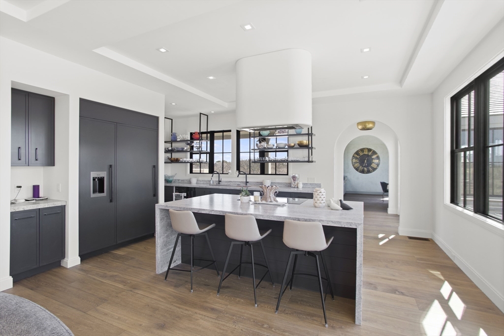 10 Maxey Pond Road Nantucket, MA 02554 - Photo 15 of 35 a view of a dining room with furniture