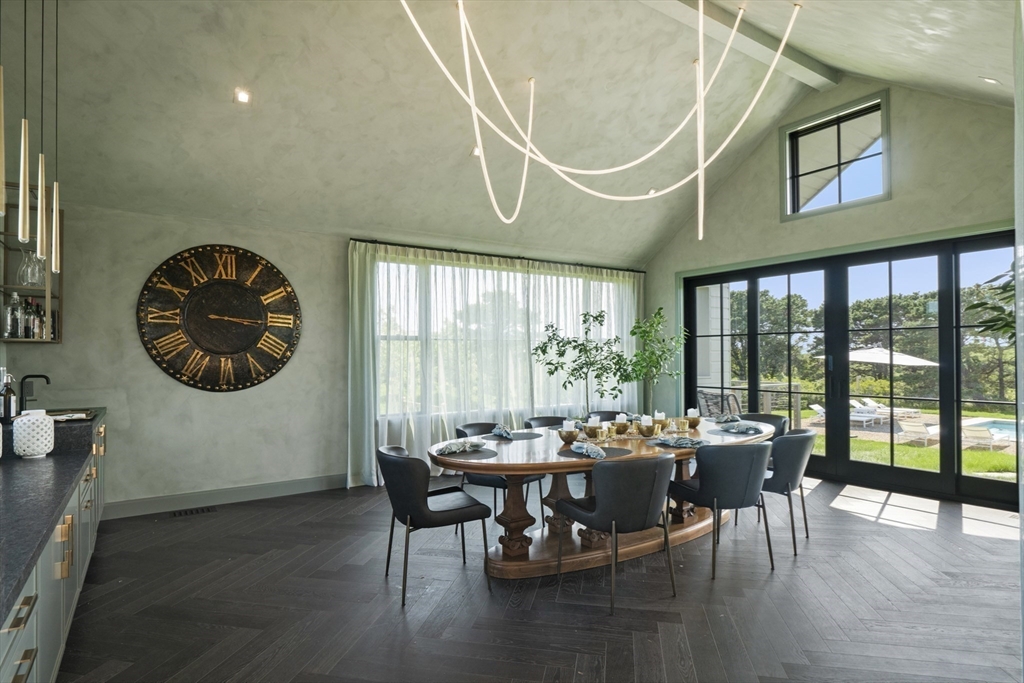 10 Maxey Pond Road Nantucket, MA 02554 - Photo 20 of 35 a dining room with furniture window and wooden floor