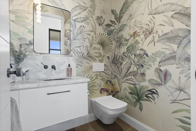 a bathroom with a toilet and a sink