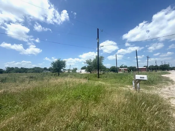 a view of a lake from a yard