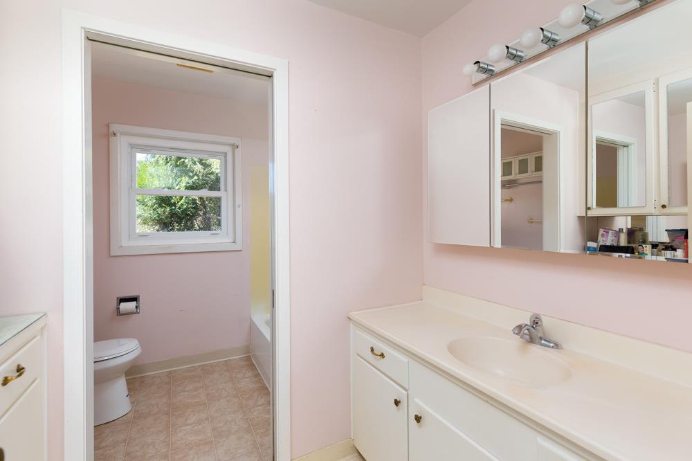 417 Maher Road Watsonville, CA 95076 - Photo 13 of 37 a bathroom with a sink a toilet and shower