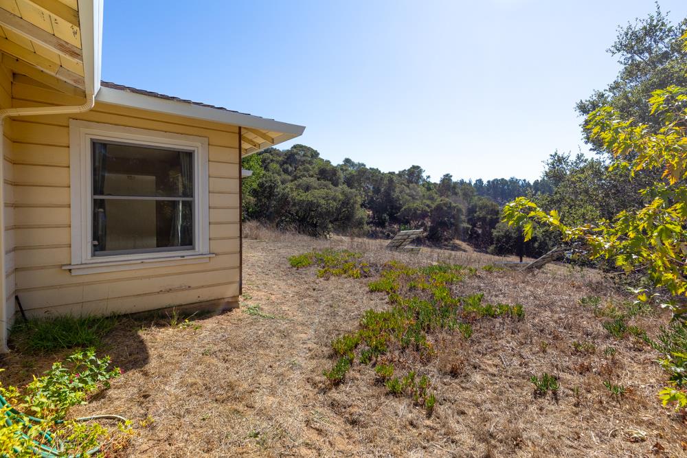 417 Maher Road Watsonville, CA 95076 - Photo 27 of 37 a house with trees in front of it