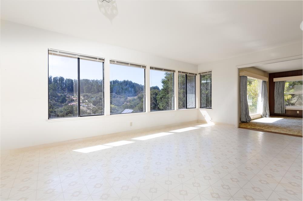 417 Maher Road Watsonville, CA 95076 - Photo 4 of 37 a view of an empty room with glass door and balcony