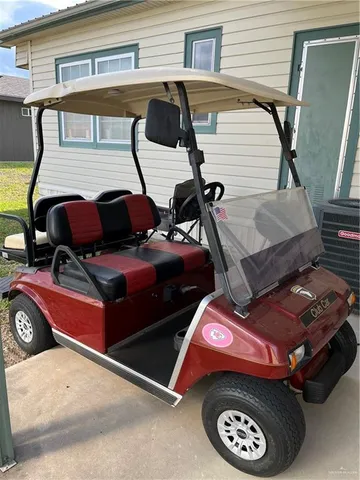 a front view of a house with parking space