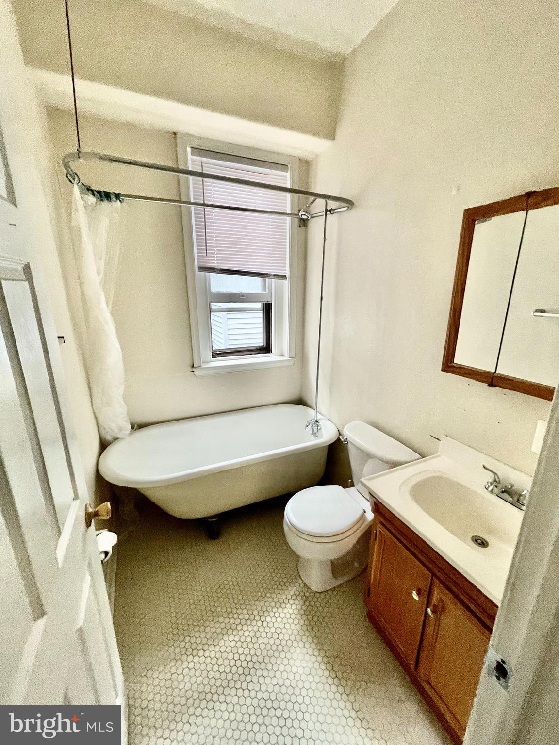 180 Manheim Street, Unit 2 Philadelphia, PA 19144 - Photo 8 of 10 a bathroom with a sink toilet and shower