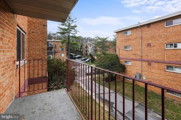a view of a balcony with city view