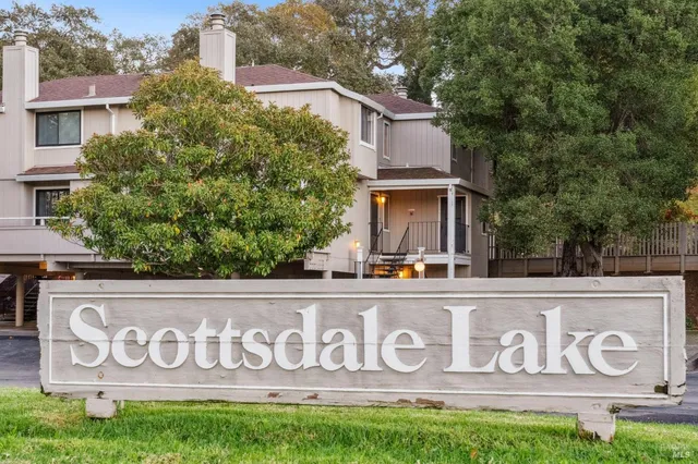 an aerial view of residential building and lake view