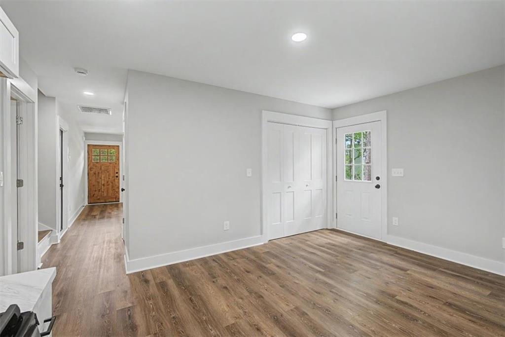 233 Old Old Alabama Road Southeast Emerson, GA 30137 - Photo 18 of 49 wooden floor in an empty room with a window