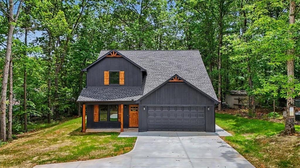 233 Old Old Alabama Road Southeast Emerson, GA 30137 - Photo 2 of 49 a front view of house with yard and green space