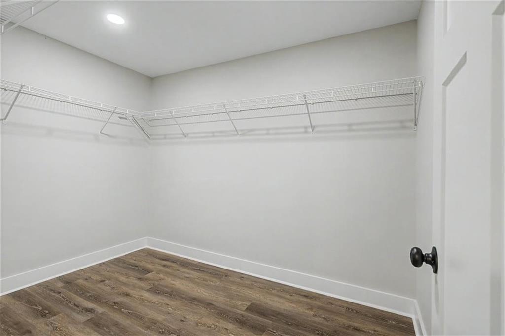 233 Old Old Alabama Road Southeast Emerson, GA 30137 - Photo 21 of 49 a view of a room with racks on the wall
