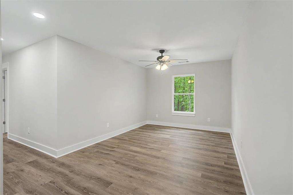 233 Old Old Alabama Road Southeast Emerson, GA 30137 - Photo 28 of 49 wooden floor in an empty room with a window