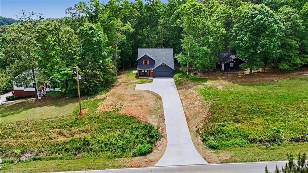 233 Old Old Alabama Road Southeast Emerson, GA 30137 - Photo 43 of 49 a house view with a garden space