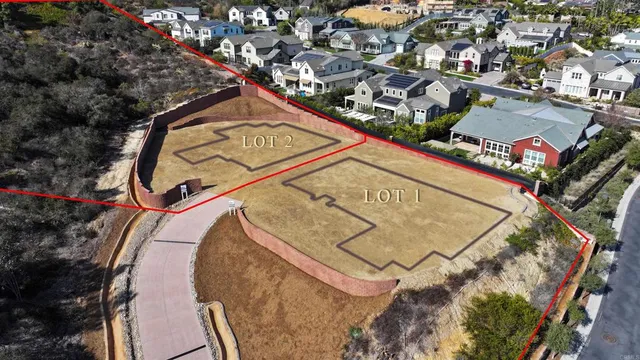 an aerial view of a house having yard