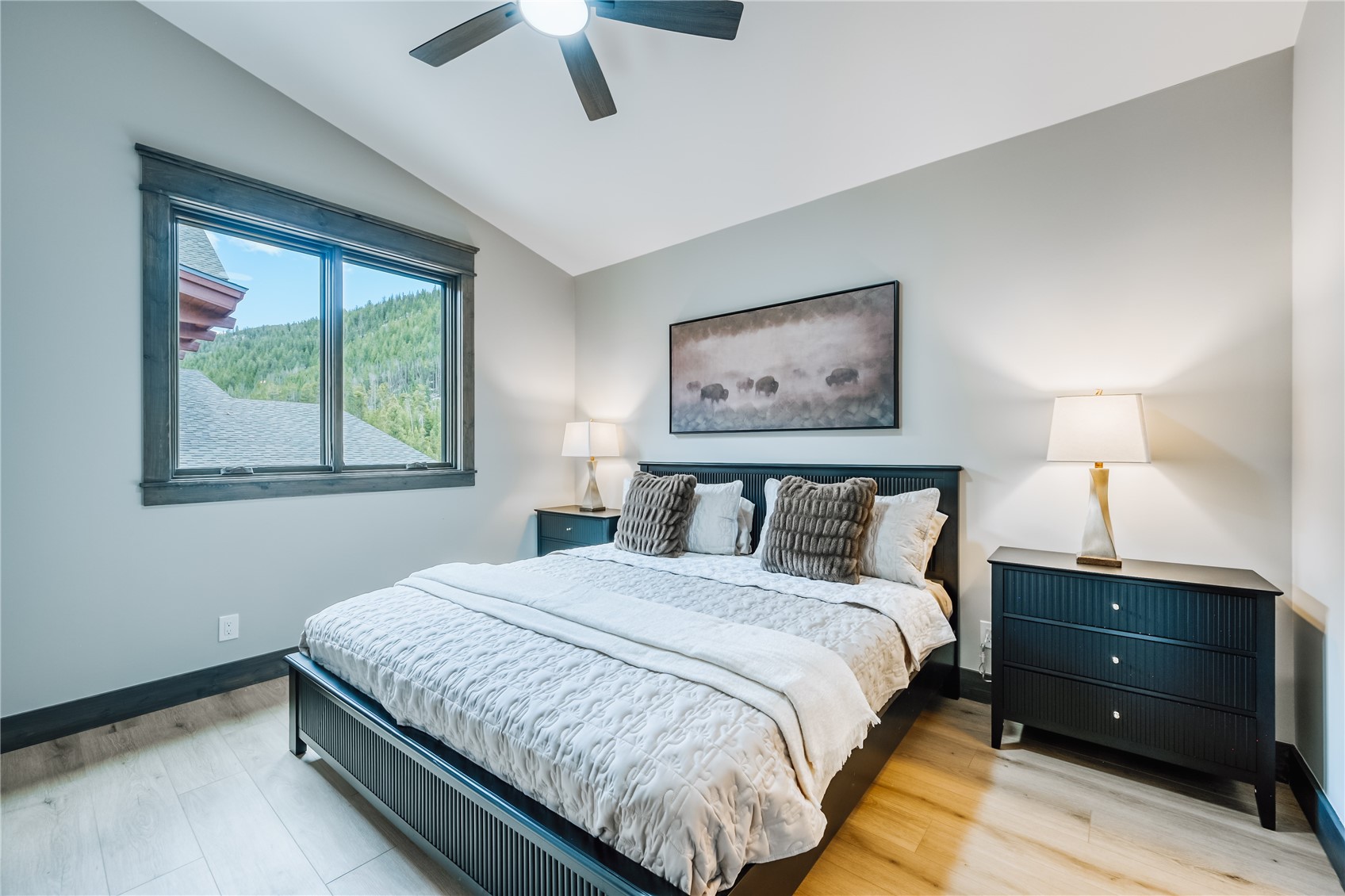 125 Lake Ridge Circle, Unit 1866 Keystone, CO 80435 - Photo 40 of 42 a bed room with a bed and a night stand