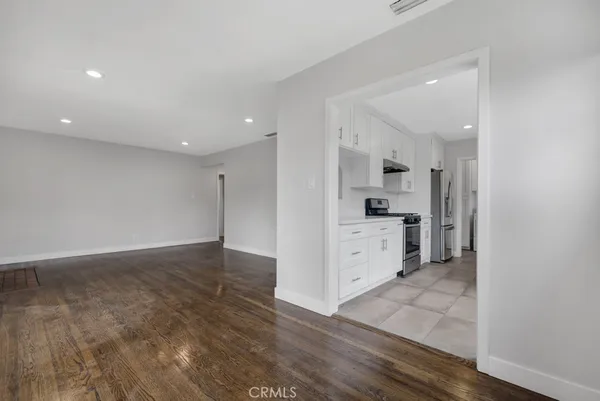 a view of a kitchen with electric appliances