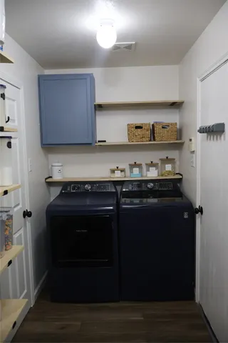 a stove top oven sitting inside of a kitchen