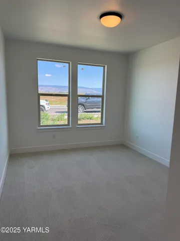 a bathroom with a sink vanity and a mirror