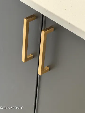 a room that has a hardwood floor and a sink