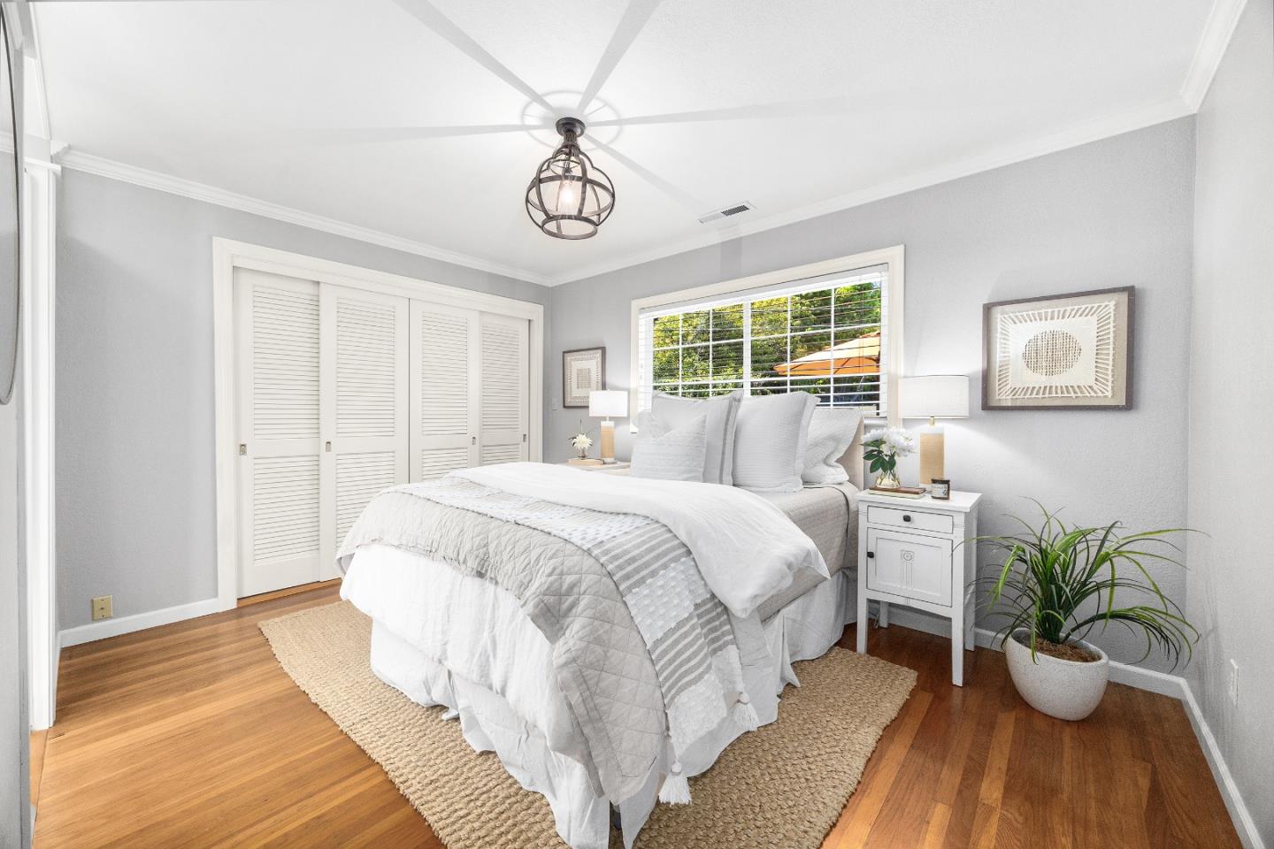 105 Wesley Street Capitola, CA 95010 - Photo 30 of 55 a spacious bedroom with bed and a window