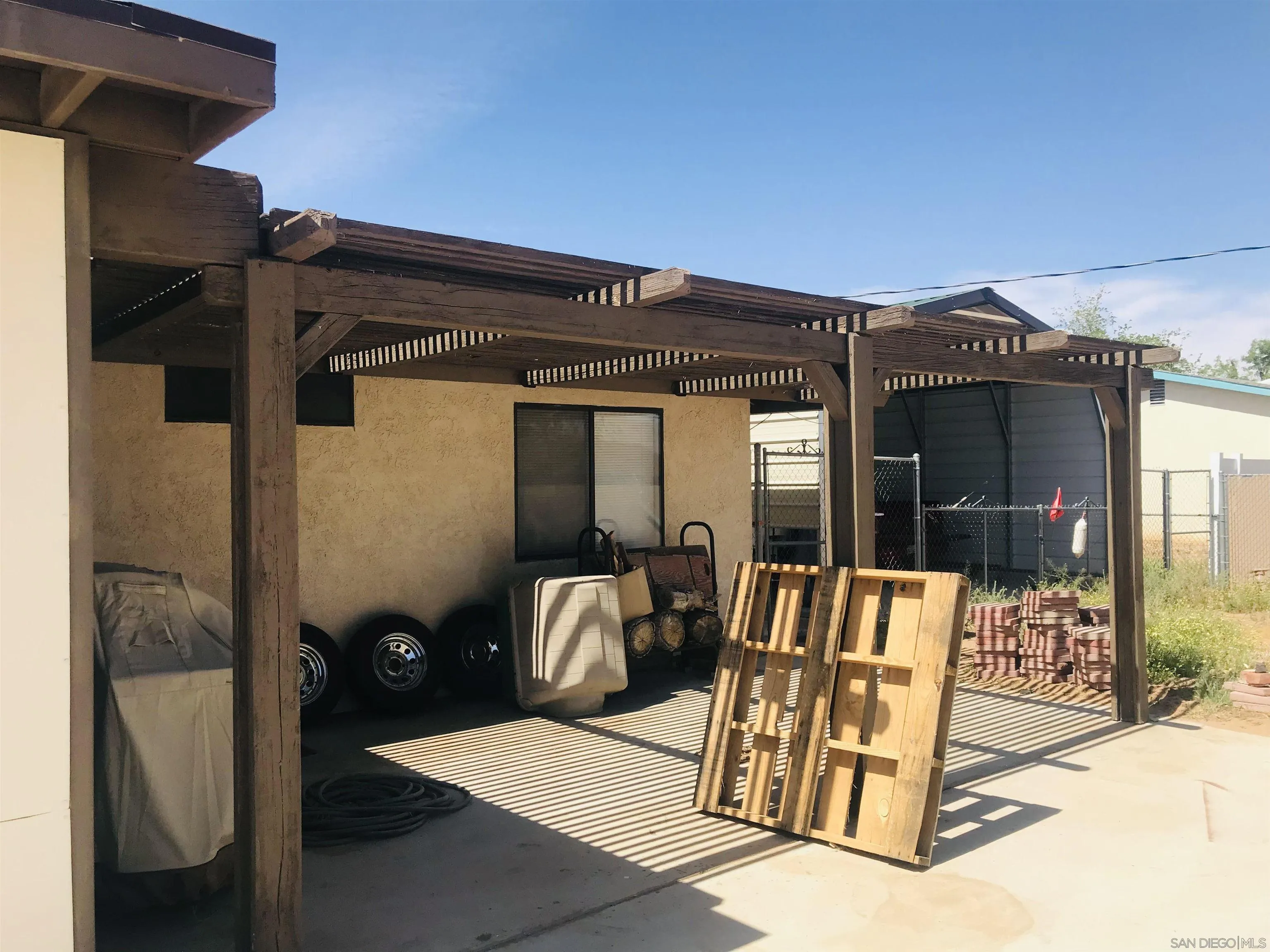 14665 Hopi Road Apple Valley, CA 92307 - Photo 11 of 21 a view of front door and porch